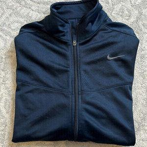 Woman’s Nike light weight jacket size Large